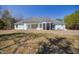 Expansive backyard with lush grass and view of house at 119 Cardinal Crest Ct, Pittsboro, NC 27312