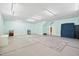 A spacious basement presents clean floors, ample lighting, and versatile potential for various uses at 119 Cardinal Crest Ct, Pittsboro, NC 27312