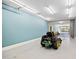 The spacious garage featuring a lawnmower, bright lighting, and ample space for various uses at 119 Cardinal Crest Ct, Pittsboro, NC 27312