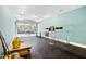The spacious garage with an open door, offering ample room and good lighting for various projects at 119 Cardinal Crest Ct, Pittsboro, NC 27312