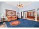 Bright living room featuring stylish sofa, high ceilings, and views to the foyer at 119 Cardinal Crest Ct, Pittsboro, NC 27312