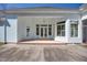 Outdoor patio with covered sitting area and serene backyard views at 119 Cardinal Crest Ct, Pittsboro, NC 27312