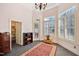 Sun Room with tiled floors, plantation shutters, and access to storage at 119 Cardinal Crest Ct, Pittsboro, NC 27312