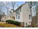 Traditional home showcasing a bay window, green shutters, and well-maintained landscaping in a suburban setting at 12 Montcrest Dr, Durham, NC 27713