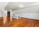 Spacious Bonus Room with hardwood floors and ample natural light at 122 W Woodridge Dr, Durham, NC 27707