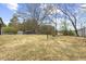 This home features a large backyard with plenty of space for gardening and outdoor enjoyment at 1230 Melrose Dr, Burlington, NC 27217