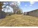 This home features a spacious backyard, enclosed with a chain link fence for added security and privacy at 1230 Melrose Dr, Burlington, NC 27217