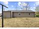 This home features a spacious backyard with a well-maintained lawn and privacy fencing at 1230 Melrose Dr, Burlington, NC 27217