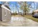 Spacious backyard with a paved patio, perfect for outdoor entertaining at 1230 Melrose Dr, Burlington, NC 27217