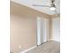 Bedroom featuring neutral paint, a ceiling fan, and wood-look vinyl flooring at 1230 Melrose Dr, Burlington, NC 27217