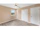 Neutral bedroom with wood floors, ceiling fan and closet at 1230 Melrose Dr, Burlington, NC 27217