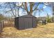 This home features an exterior shed, providing ample storage space for tools and equipment at 1230 Melrose Dr, Burlington, NC 27217