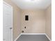 Utility room featuring neutral paint, gray vinyl flooring, and a utility closet at 1230 Melrose Dr, Burlington, NC 27217
