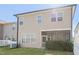 Spacious backyard with a screened-in porch and well-kept lawn, great for outdoor enjoyment at 125 Station Dr, Morrisville, NC 27560