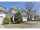 Inviting home exterior with well-manicured landscaping and a welcoming front entrance at 125 Station Dr, Morrisville, NC 27560