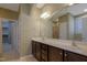 Bright main bathroom features a double sink vanity and large mirror at 125 Station Dr, Morrisville, NC 27560