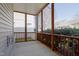 Relaxing screened-in porch offers outdoor living space with views of the backyard at 125 Station Dr, Morrisville, NC 27560