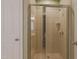 A beautifully tiled shower with glass door at 125 Station Dr, Morrisville, NC 27560