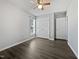 Bedroom with a ceiling fan, new hardwood floors, a closet, and a window at 125 Wynnridge Dr, Angier, NC 27501