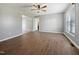 An open living area featuring wood-style flooring, neutral walls, and great natural light at 125 Wynnridge Dr, Angier, NC 27501