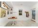 Basement featuring a dining table and adjacent exterior door at 132 Fiori Hill S Dr, Hillsborough, NC 27278