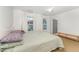 Bright bedroom with a fan, natural light, and neutral carpet at 132 Fiori Hill S Dr, Hillsborough, NC 27278