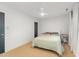 Bedroom with neutral carpet, white walls, and a blue door at 132 Fiori Hill S Dr, Hillsborough, NC 27278