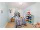 bedroom features a whimsical design, blue accents, ample space, and playful decor at 132 Fiori Hill S Dr, Hillsborough, NC 27278