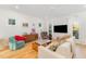 Comfortable living room featuring hardwood floors, neutral tones, and modern decor at 132 Fiori Hill S Dr, Hillsborough, NC 27278