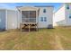 Spacious backyard with a screened porch perfect for outdoor entertaining at 1417 Underbrush Dr, Durham, NC 27703