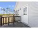 Back porch featuring a deck, white siding, and a view of the property at 176 Clear Water Dr, Smithfield, NC 27577