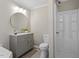 Bright bathroom featuring a modern vanity, toilet, and shower at 176 Clear Water Dr, Smithfield, NC 27577