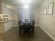 Dining area with table and chairs under a modern light fixture at 176 Clear Water Dr, Smithfield, NC 27577