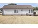 A view of the home's siding and yard at 176 Clear Water Dr, Smithfield, NC 27577