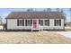 Charming single-story home showcasing a red front door and a well-maintained lawn at 176 Clear Water Dr, Smithfield, NC 27577