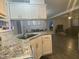 Modern kitchen with granite countertops and a view of a dining area at 176 Clear Water Dr, Smithfield, NC 27577