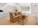 Spacious bonus room with a casual seating area, built-in storage, and Carolina blue accents at 2207 Oxford Rd, Raleigh, NC 27608