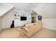 This living room features built-in shelving, a comfortable couch, and natural light at 2207 Oxford Rd, Raleigh, NC 27608