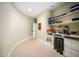 This office features built in shelving, drawers and a light paint color at 2207 Oxford Rd, Raleigh, NC 27608