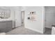 Comfortable Bedroom featuring shelving, and a view into a connected bathroom at 228 Nahunta Dr, Apex, NC 27539