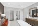 Comfortable bedroom featuring neutral walls, adjacent closet, and stylish mirror at 228 Nahunta Dr, Apex, NC 27539