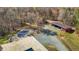 Aerial view of home with pool, storage shed, and outbuilding at 23901 Nc-902, Bennett, NC 27208