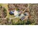 Aerial view of home with a large pool and a shed in a wooded lot at 23901 Nc-902, Bennett, NC 27208