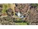 Aerial view of the home, yard and pool, showing a wooded area all around the property at 23901 Nc-902, Bennett, NC 27208