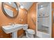 A bright bathroom with a walk-in shower and single sink at 23901 Nc-902, Bennett, NC 27208