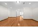 Large bonus room with hardwood floors and natural lighting, offering versatile space at 23901 Nc-902, Bennett, NC 27208