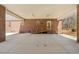 Spacious carport featuring a concrete floor, exposed brick and a ramp entrance at 23901 Nc-902, Bennett, NC 27208
