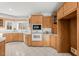Well-equipped kitchen with stainless steel appliances, white countertops, and abundant cabinet space at 23901 Nc-902, Bennett, NC 27208