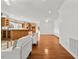 Open-concept living room with hardwood floors, ample space, and seamless kitchen integration at 23901 Nc-902, Bennett, NC 27208