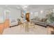 Bright living room featuring hardwood floors, neutral decor, and an abundance of natural light at 23901 Nc-902, Bennett, NC 27208
